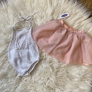 Crocheted romper & pink tutu skirt